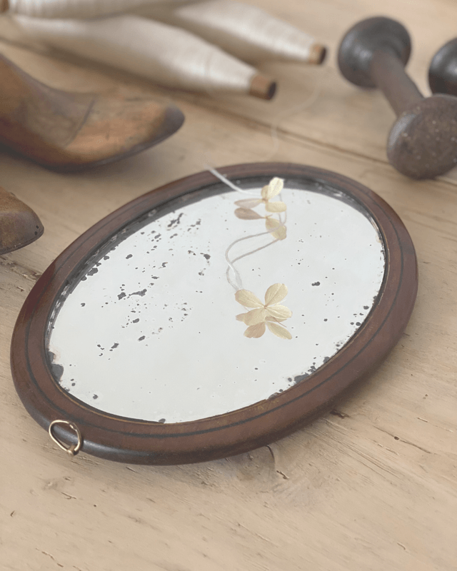 Petit miroir ovale