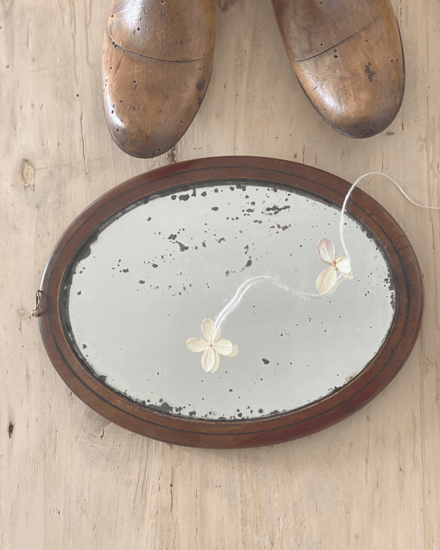 Petit miroir ovale